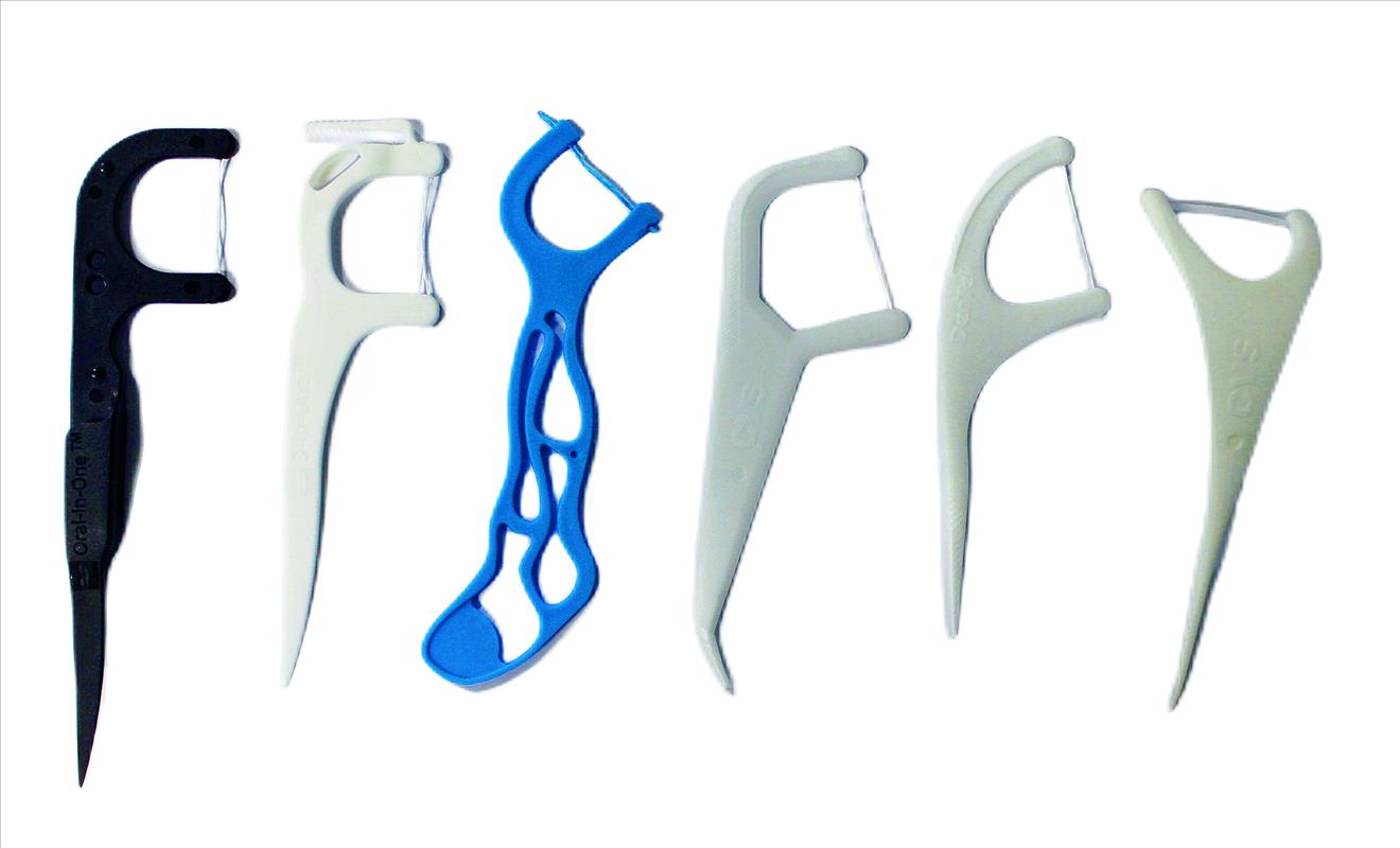 Various types of dental floss sticks